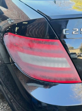 Before headlight restoration Tail Light Restoration showing oxidation and cloudy lens in Greensboro NC